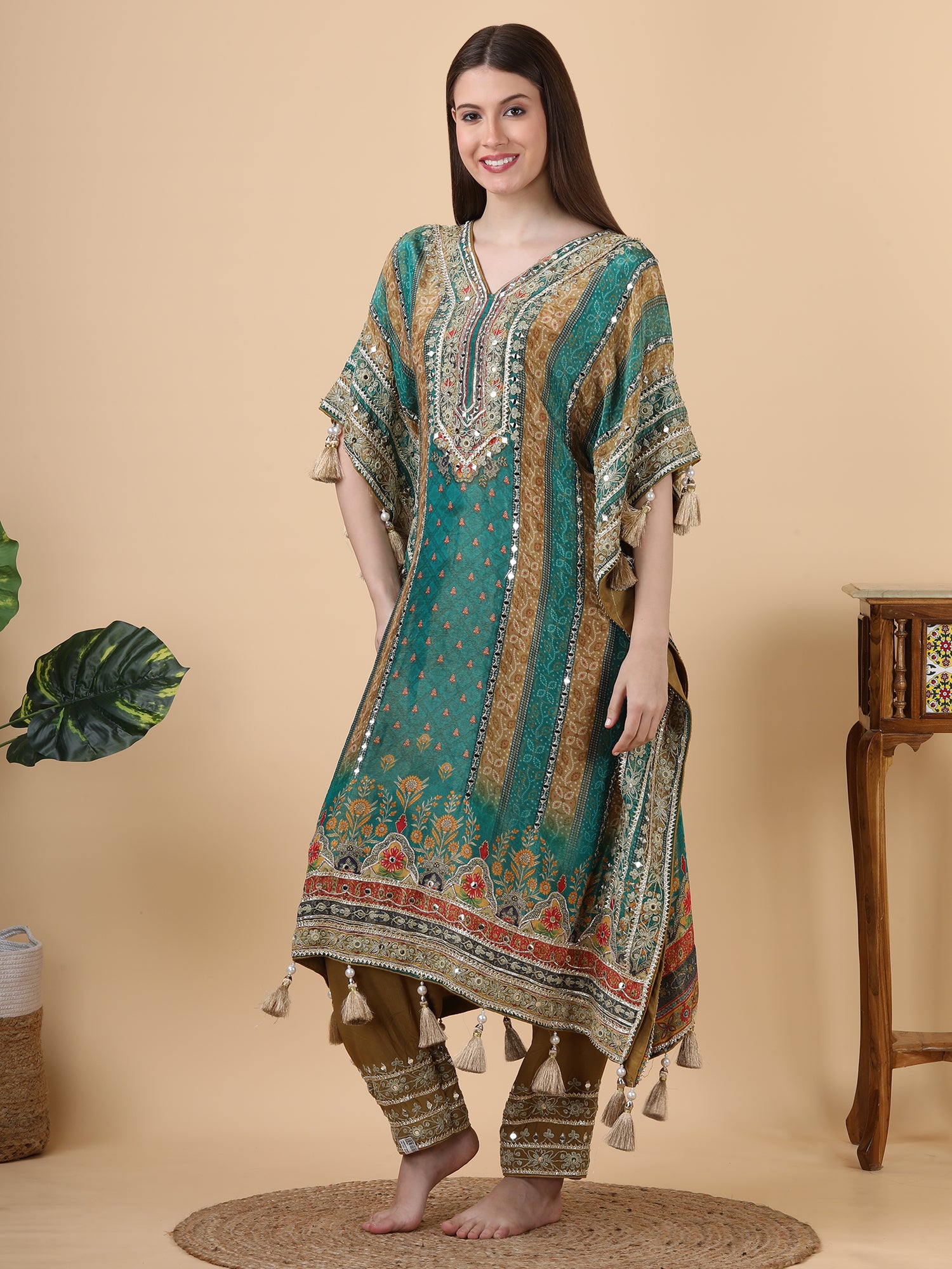 FABRIC- shimmer crepe                          EMBROIDERY-mirror , gota                         DESIGN PATTERN-kaftan                      WITH-pants