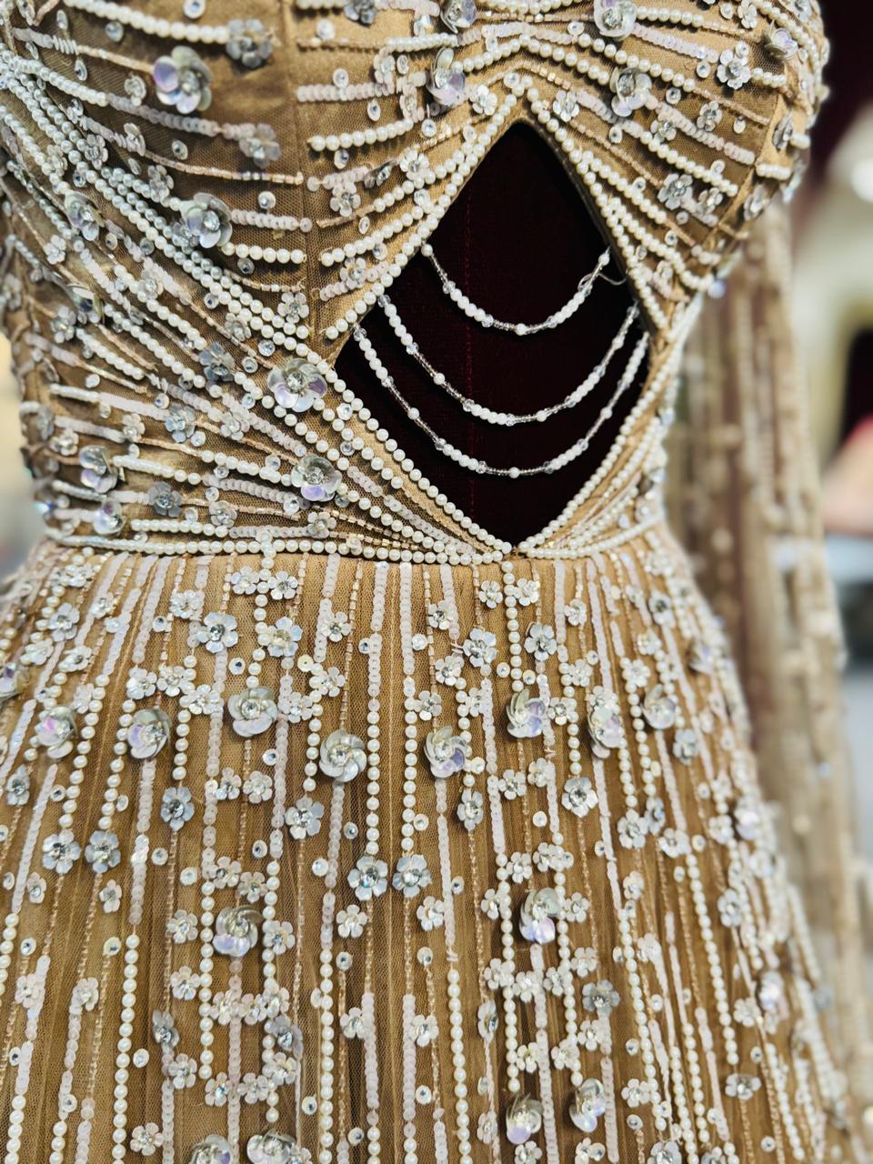 Golden Champagne Couture Gown with Diamond-Cut Bodice and Crystal Droplets