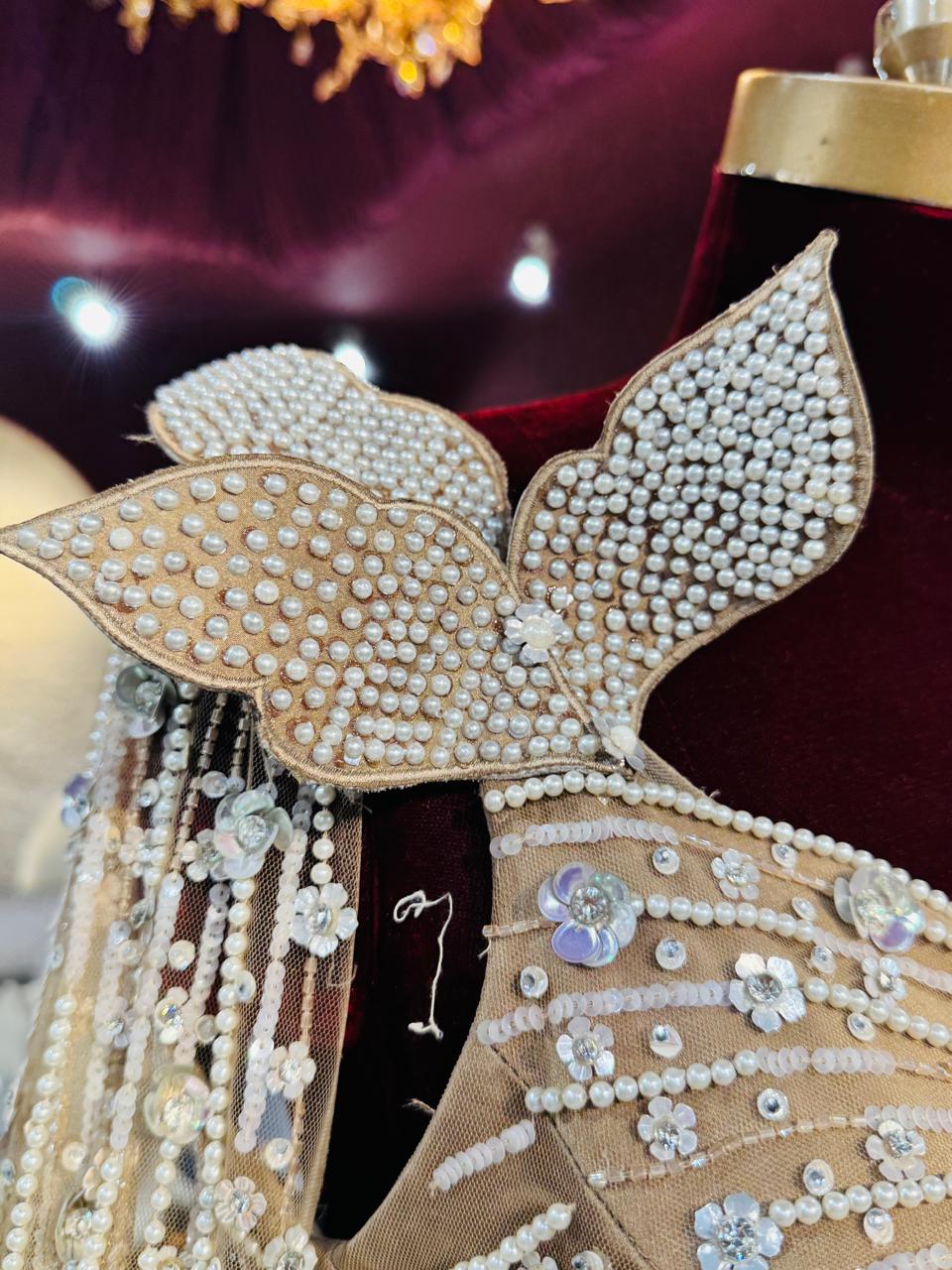 Golden Champagne Couture Gown with Diamond-Cut Bodice and Crystal Droplets