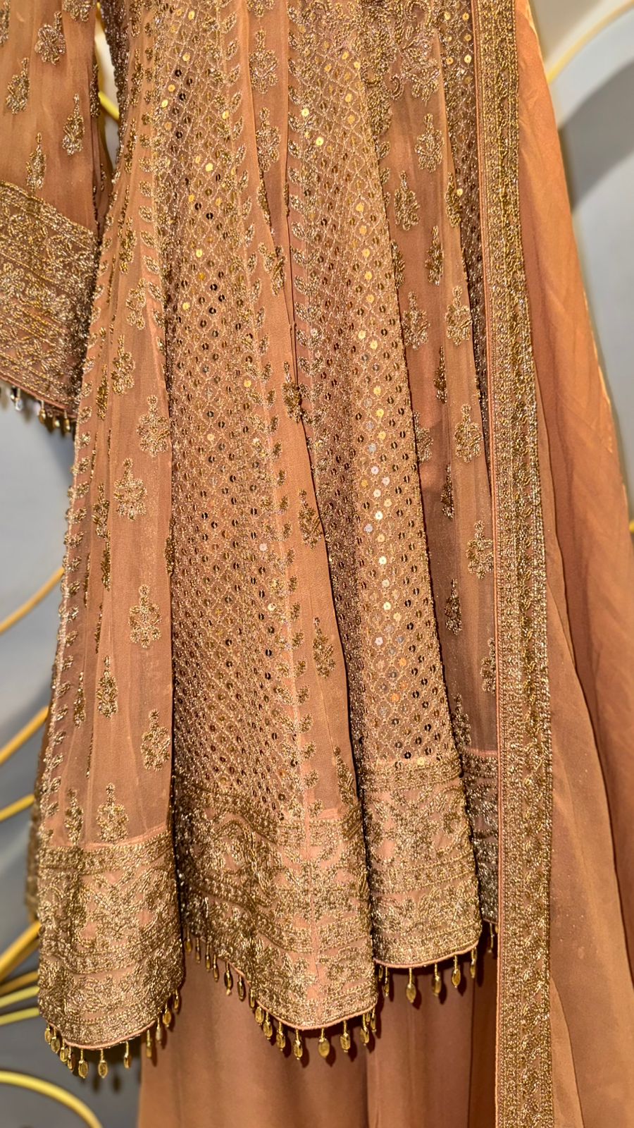 Designer Peach-Gold Peplum Sharara Set with Intricate Zari and Mirror Work