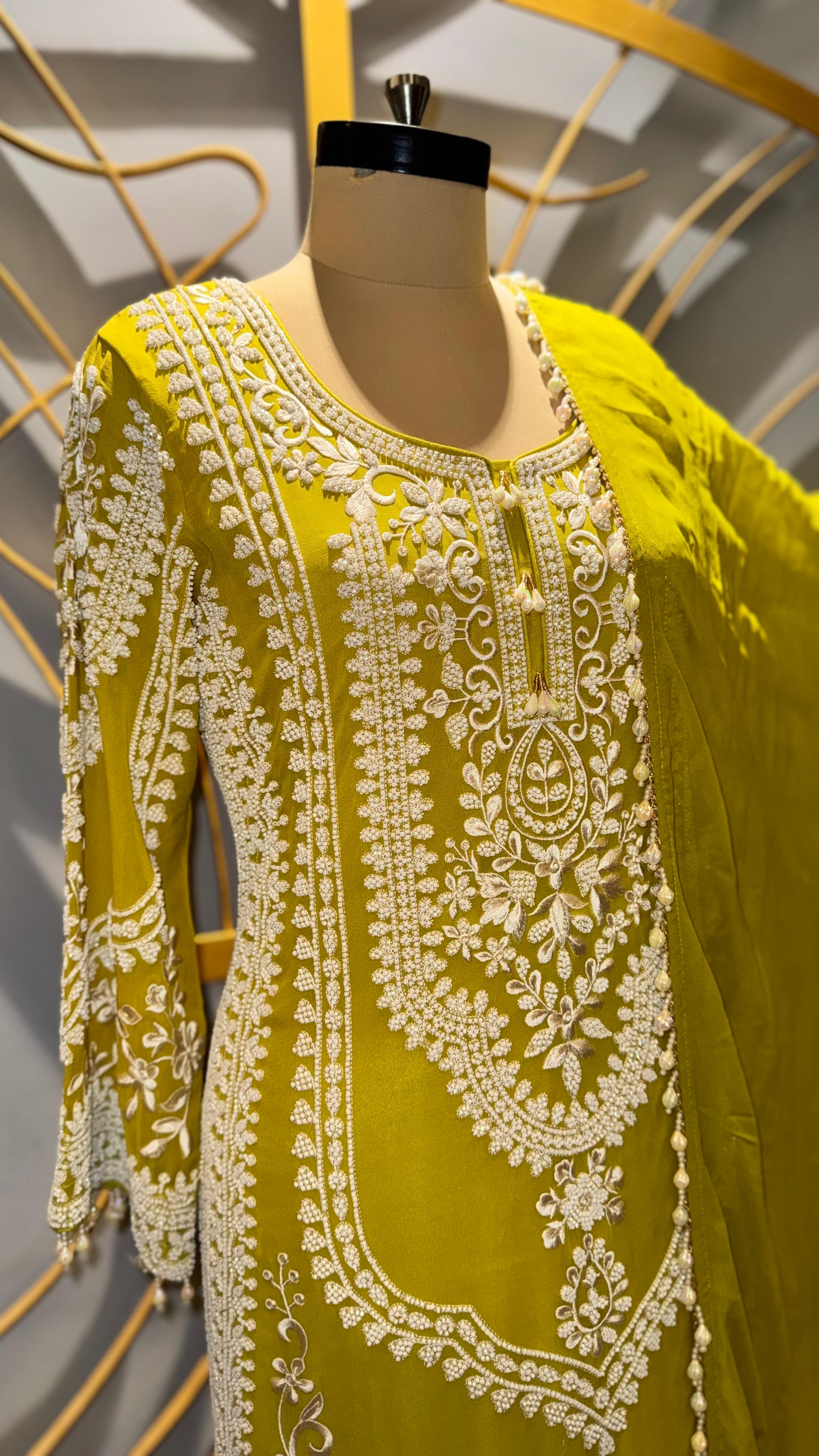 Vibrant Lime Green Georgette Suit with Intricate White Threadwork and Pearl Finishes