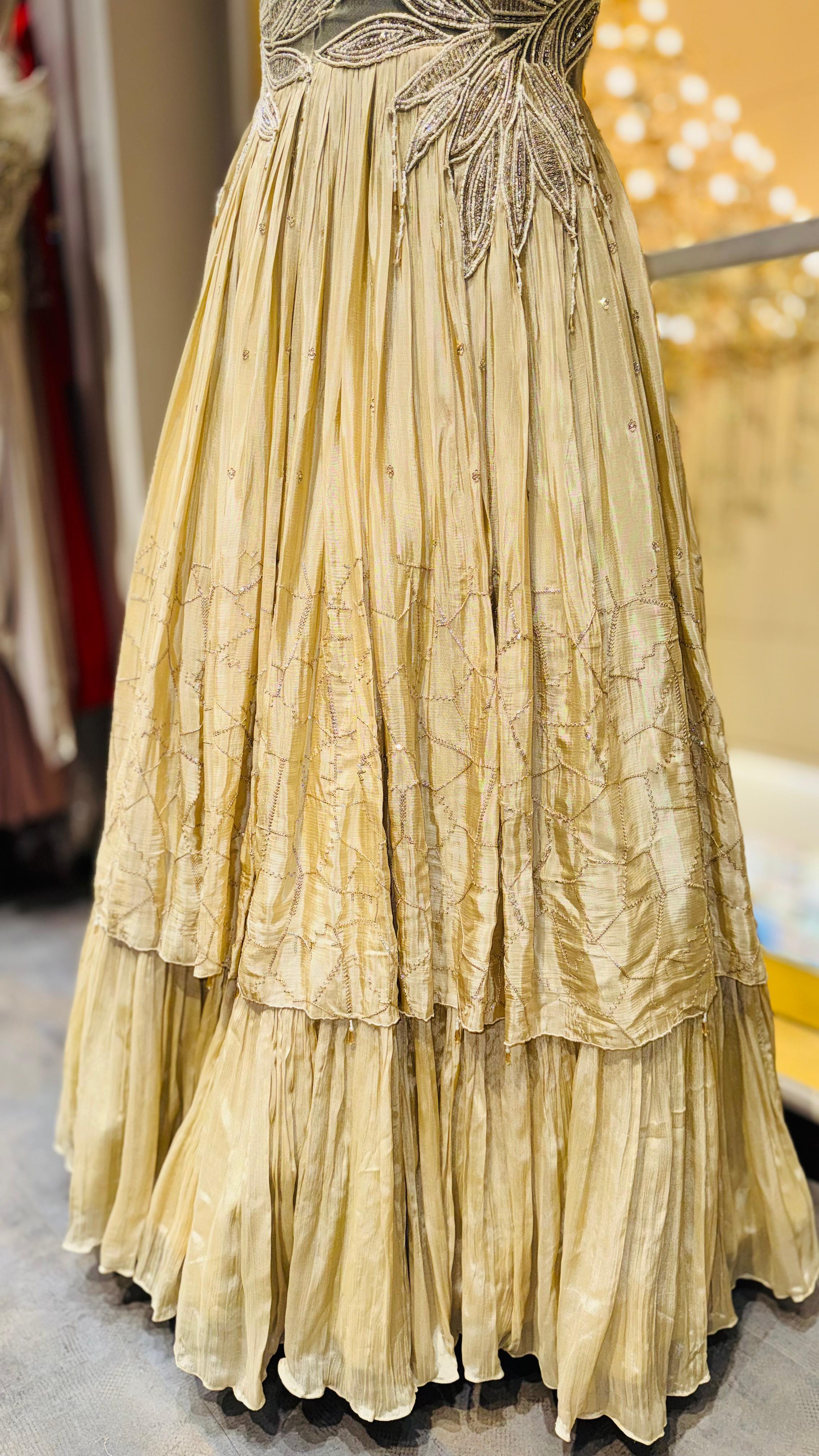 Designer Champagne Gold Gown with Asymmetric Leaf Embroidery and Tiered Pleats