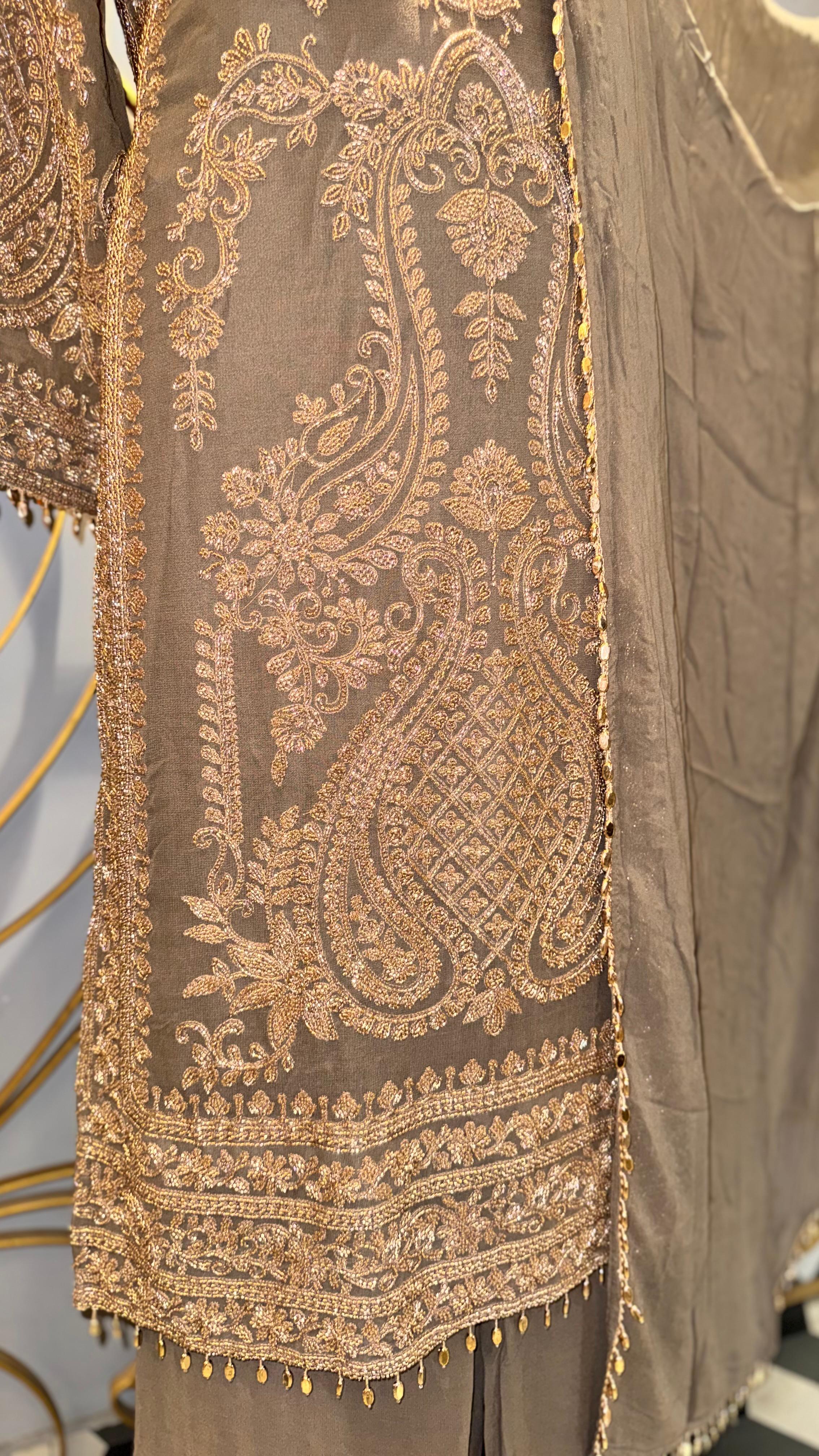 Vibrant Mustard Yellow Georgette Suit with Intricate White Floral Print and Sparkling Sequins
