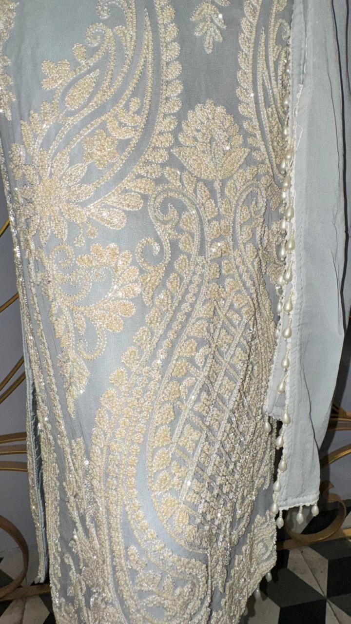 Premium Powder Blue Georgette Suit with Intricate White Thread Embroidery and Pearl Tassels
