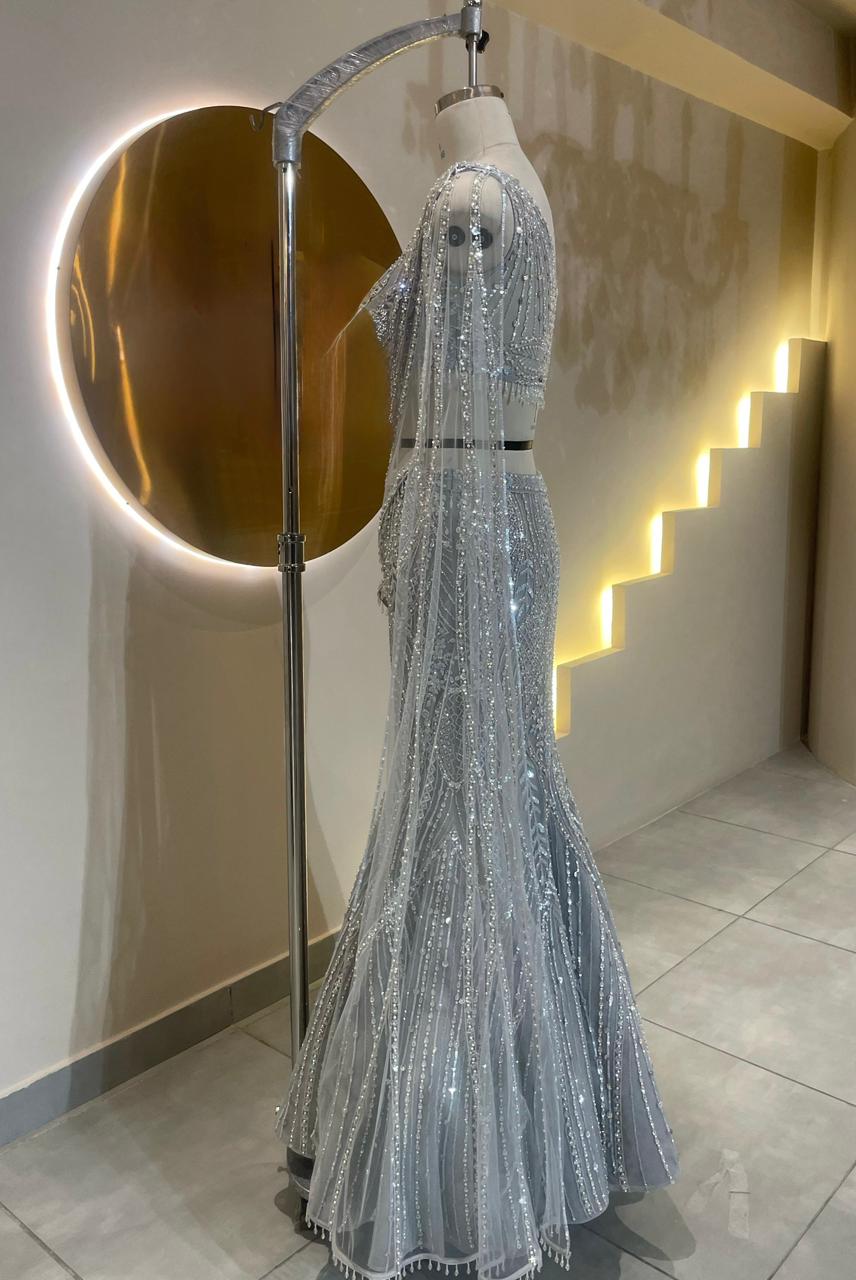 Designer Silver-Grey Fishcut Lehenga with Pre-Draped Saree Silhouette and Crystal Embellishments