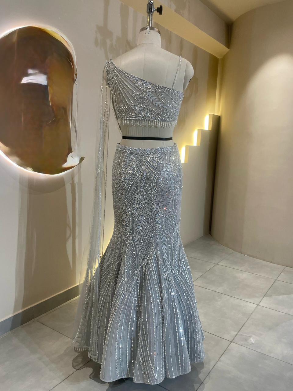Designer Silver-Grey Fishcut Lehenga with Pre-Draped Saree Silhouette and Crystal Embellishments