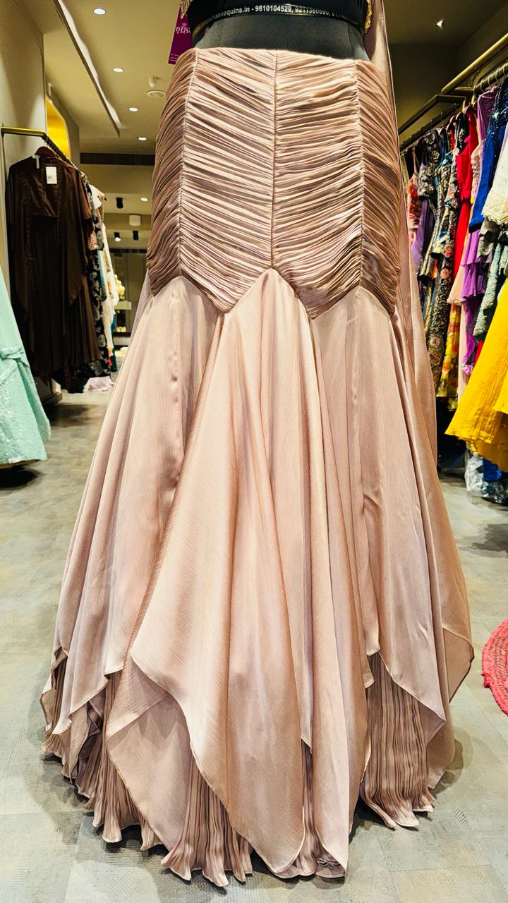Designer Rose Gold Fishcut Lehenga with Ruched Chevron Detailing and Pearl-Fringe Choker Bustier