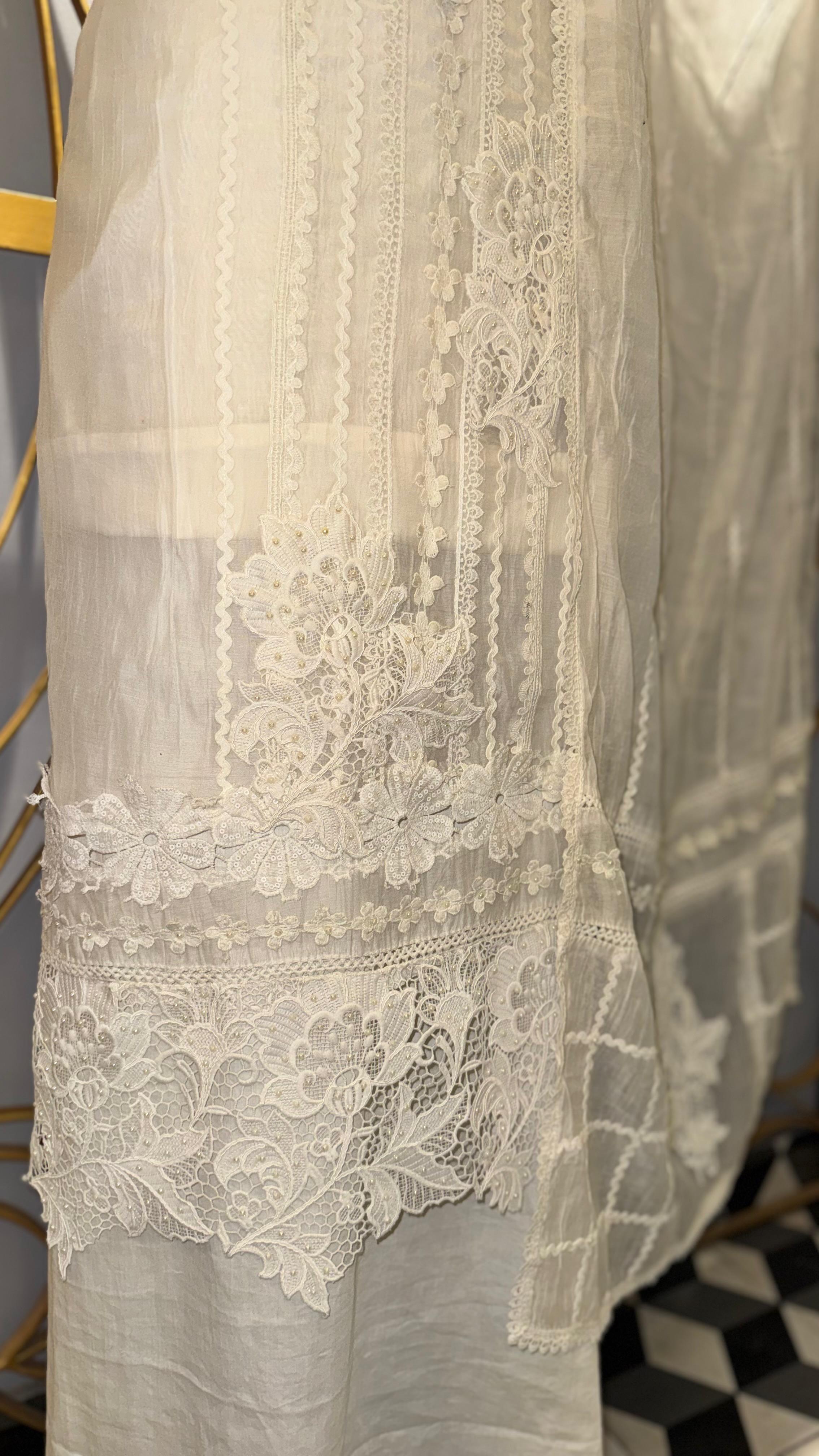 Premium Off-White Mul Cotton Unstitched Suit with Intricate Cut-work Lace and Floral Embroidery