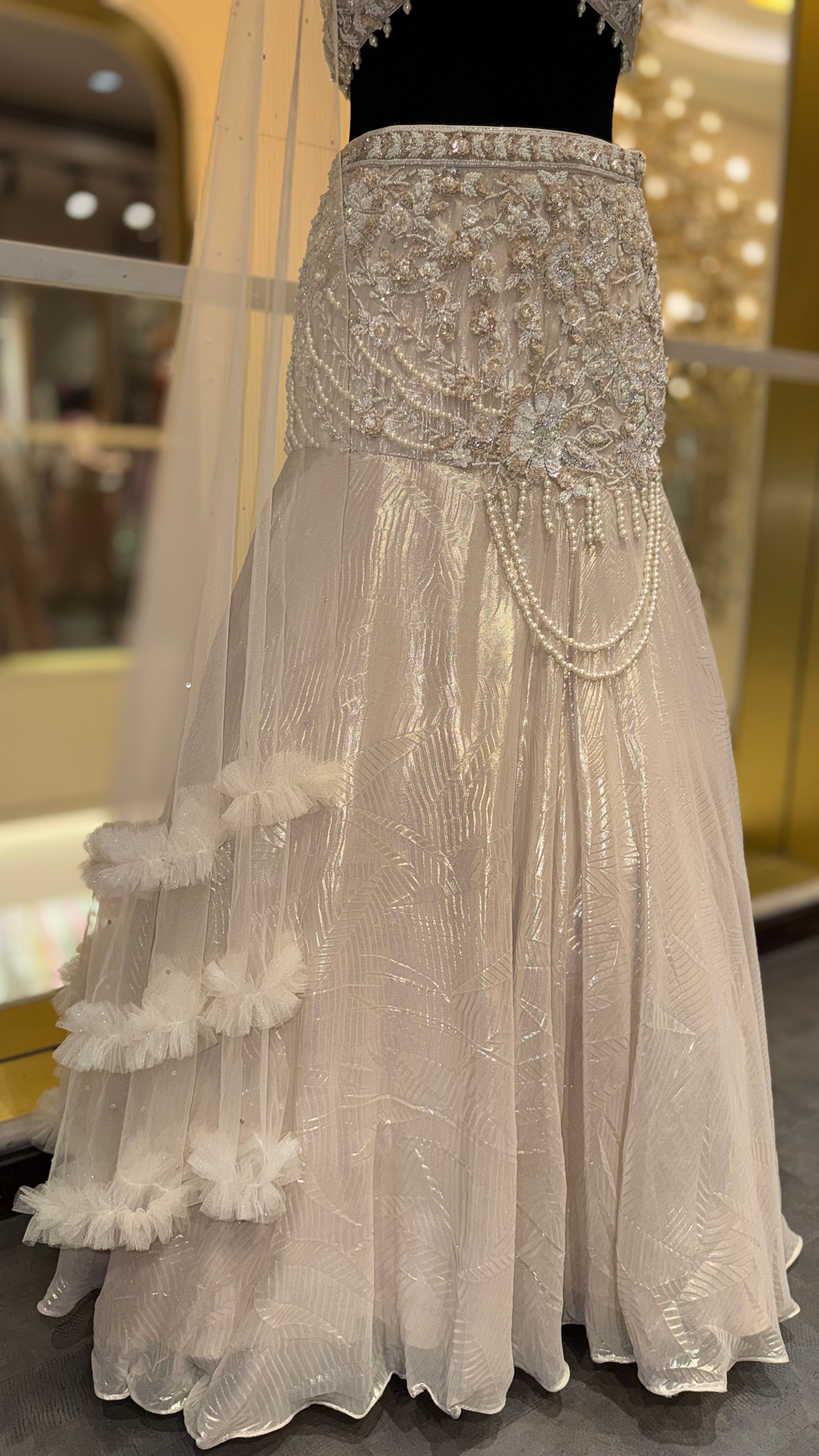 Luxury Pearl White Designer Embroidered Lehenga Set with One-Shoulder Blouse & Net Dupatta