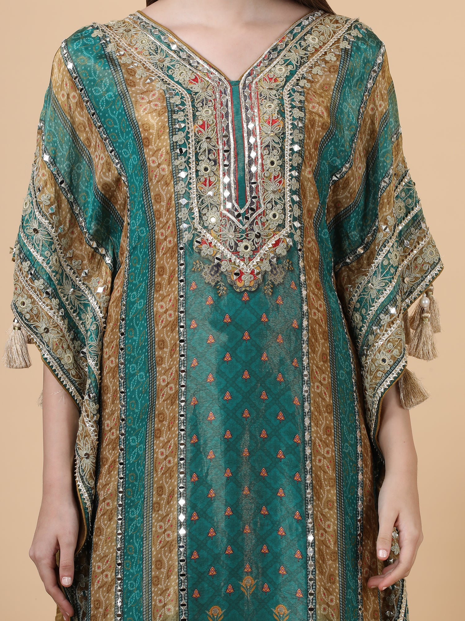 FABRIC- shimmer crepe                          EMBROIDERY-mirror , gota                         DESIGN PATTERN-kaftan                      WITH-pants
