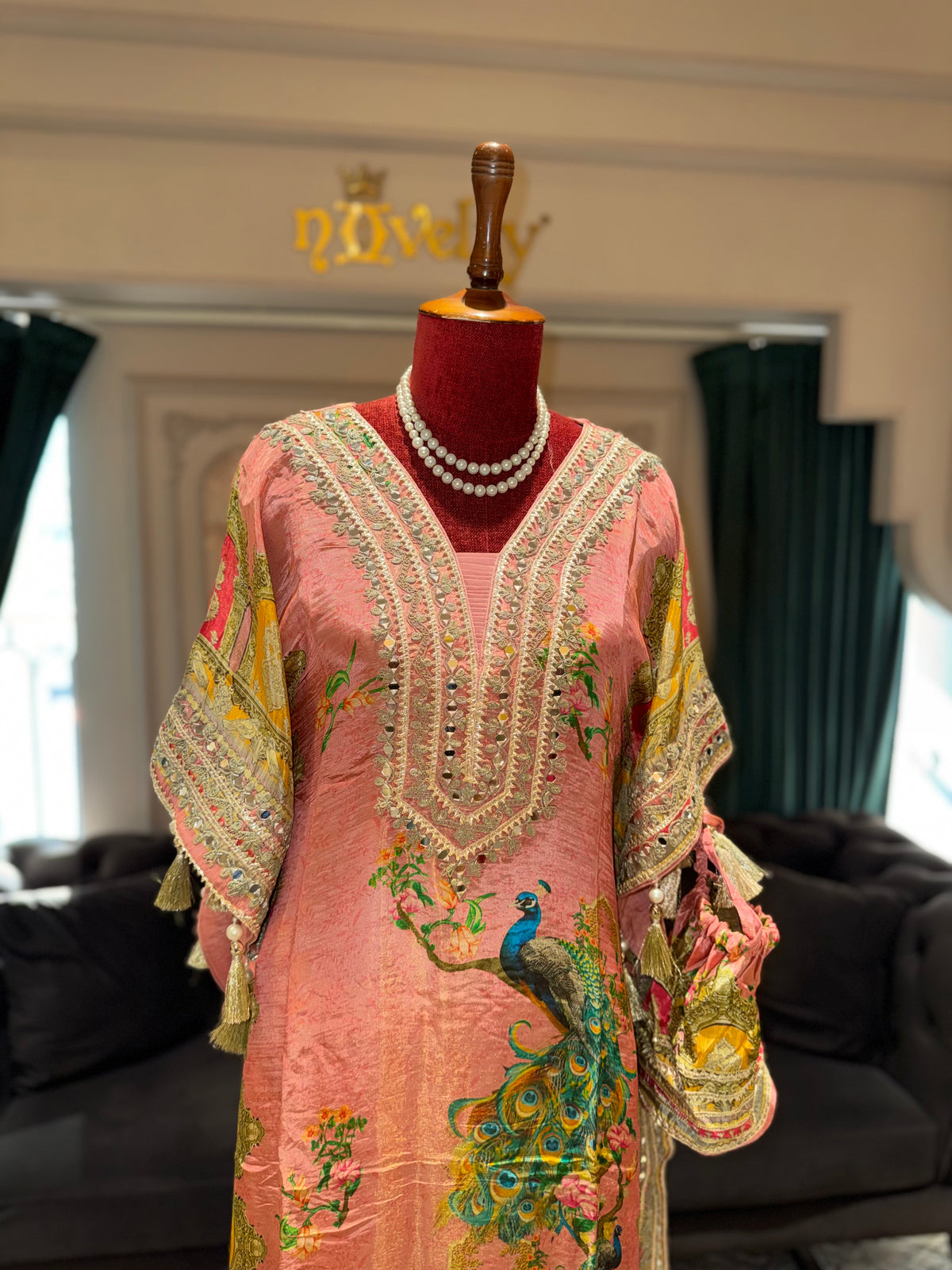 Premium Peach Silk Digital Printed Kaftan with Mirror-Work Placket, Tassels, and Matching Dhoti Pants