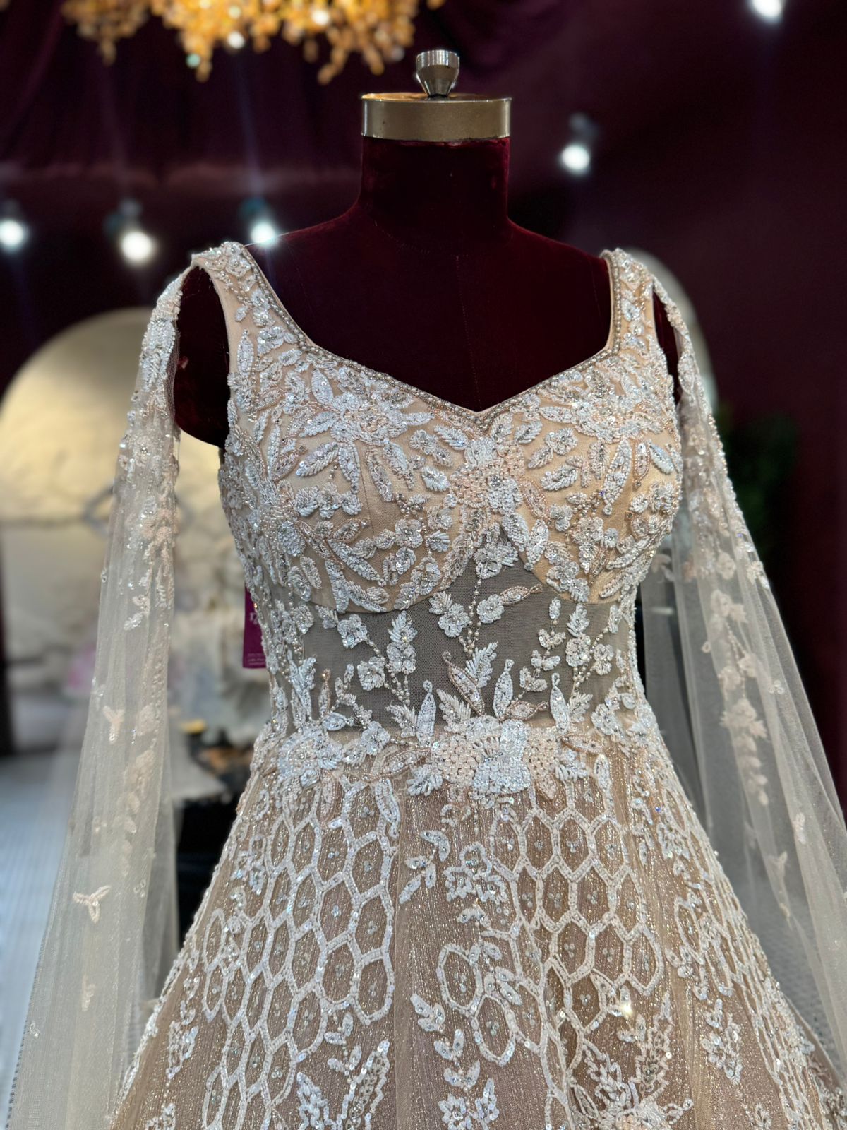 Regal Champagne Gold Hand-Embroidered Bridal Gown with Cape Sleeves