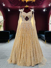 Golden Champagne Couture Gown with Diamond-Cut Bodice and Crystal Droplets