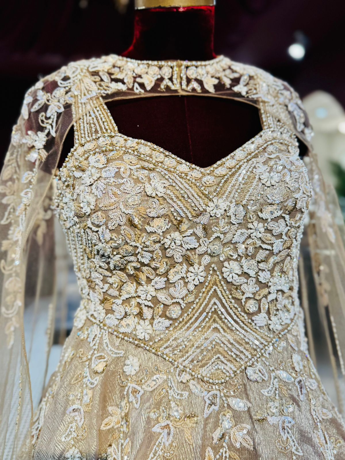Golden Champagne Couture Gown with Diamond-Cut Bodice and Crystal Droplets