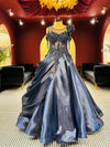 Premium Midnight Blue Metallic Gown with 3D Floral Appliqué and Draped Silhouette