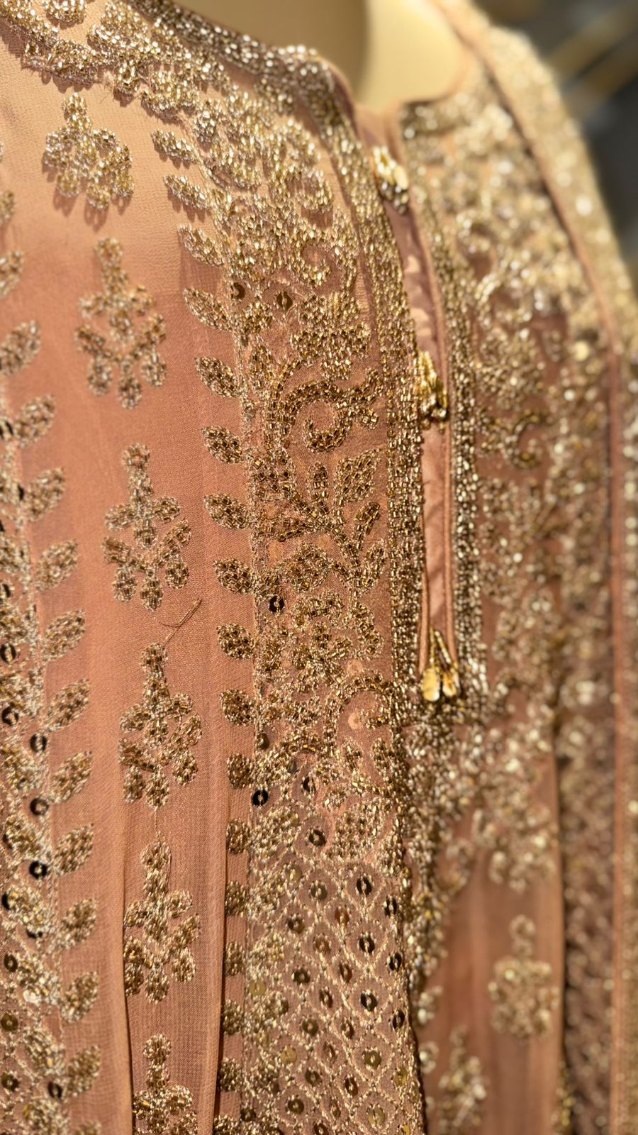 Designer Peach-Gold Peplum Sharara Set with Intricate Zari and Mirror Work