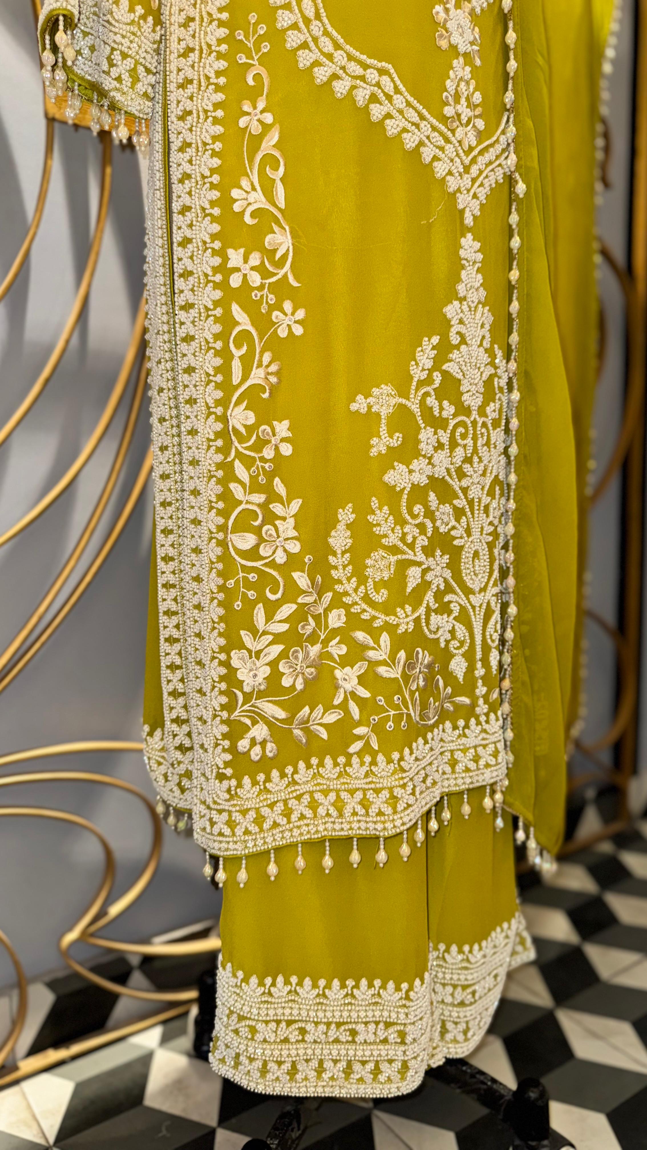 Vibrant Lime Green Georgette Suit with Intricate White Threadwork and Pearl Finishes