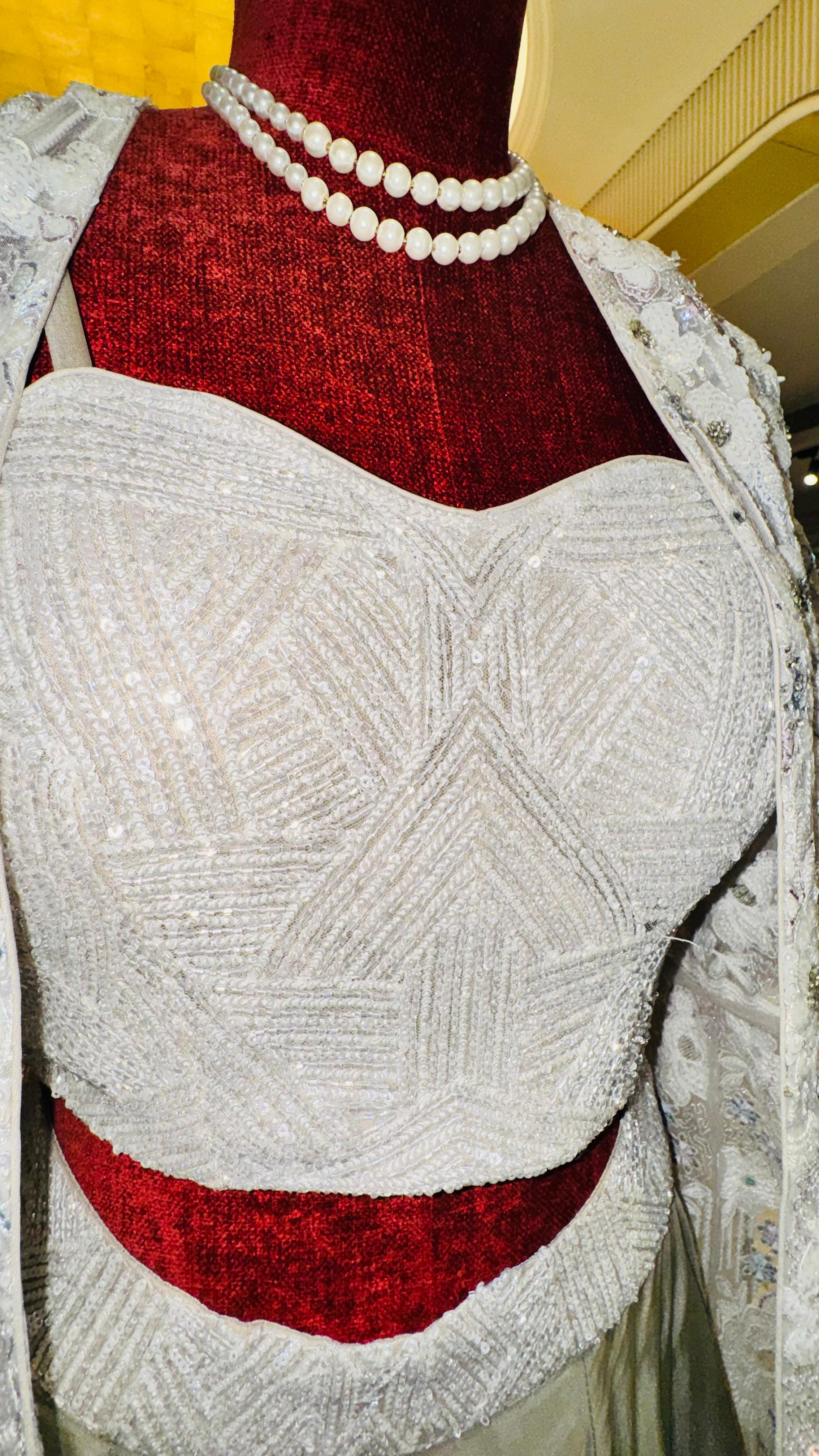 Designer Ivory 3-Piece Lehenga Set with Heavily Embroidered Long Jacket and Sweetheart Bustier