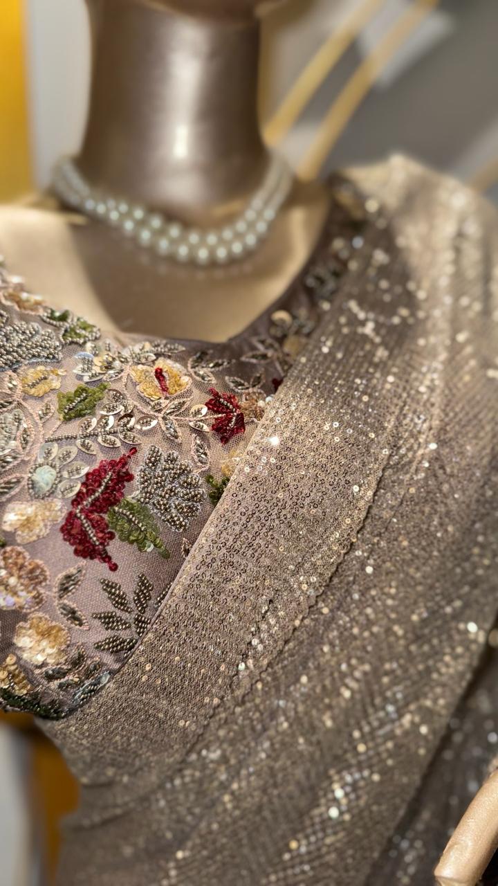 Designer Silver-Taupe Full Sequin Saree with Embroidered Floral Blouse and Tassel Detail
