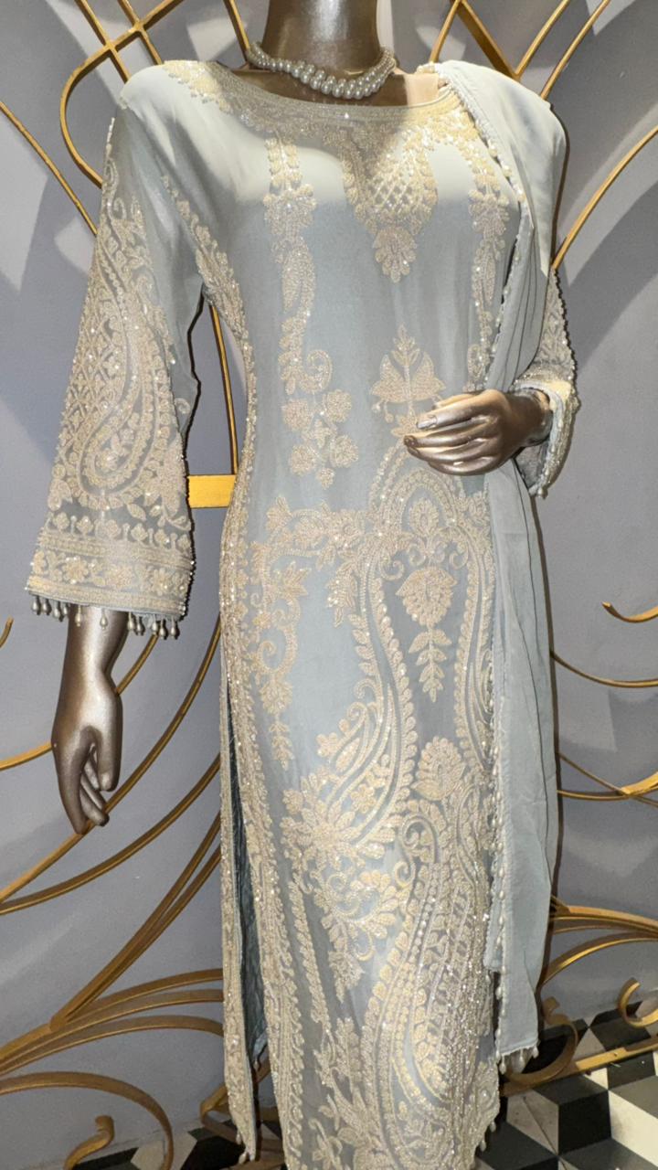 Premium Powder Blue Georgette Suit with Intricate White Thread Embroidery and Pearl Tassels