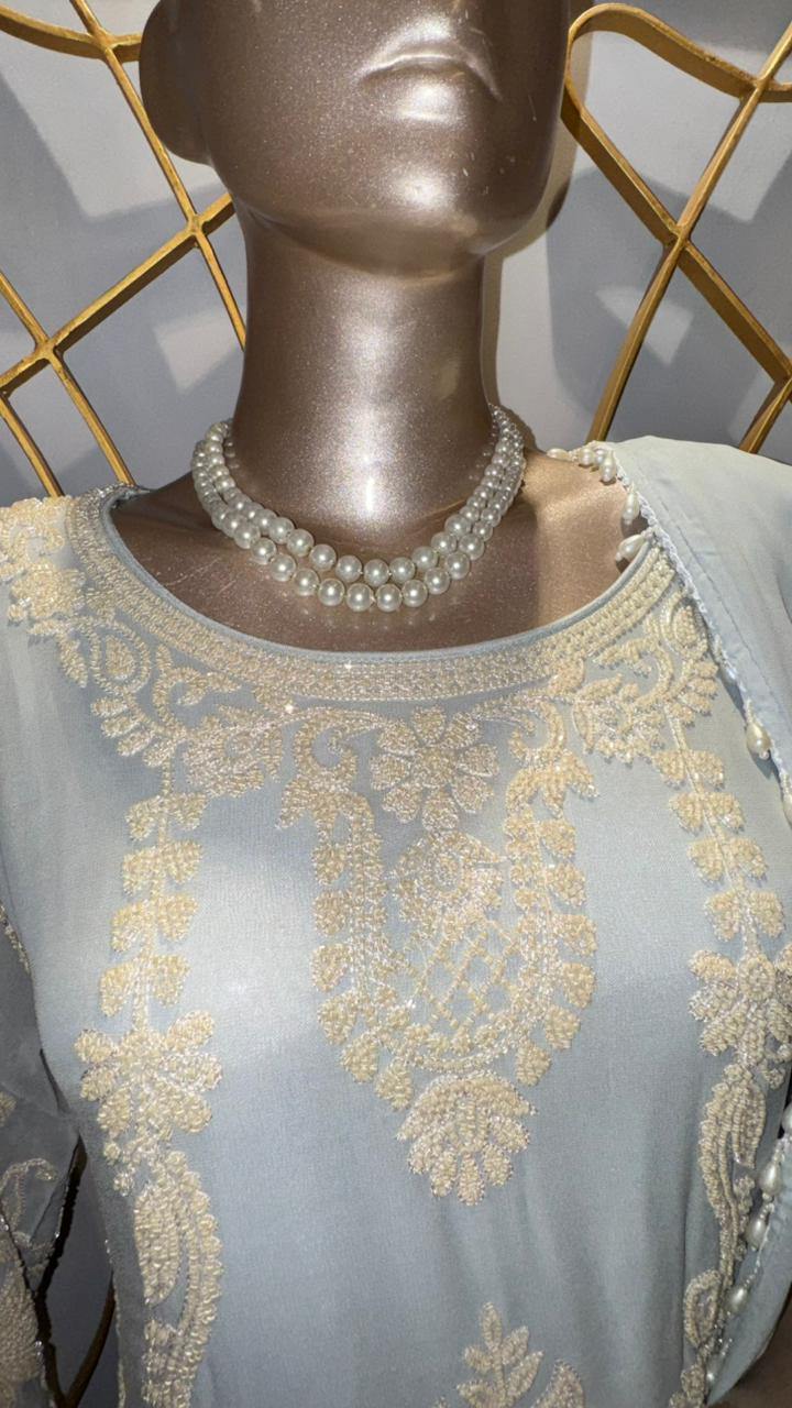 Premium Powder Blue Georgette Suit with Intricate White Thread Embroidery and Pearl Tassels