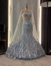 Designer Icy Blue Fishcut Lehenga with 3D Feather Appliqué and Crystal Cape Sleeves