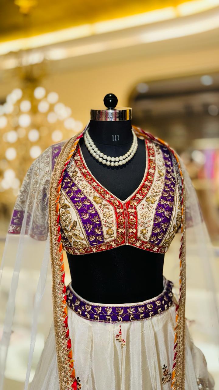Premium Off-White Georgette Lehenga with Violet & Red Zari Border and Attached Cape Dupatta