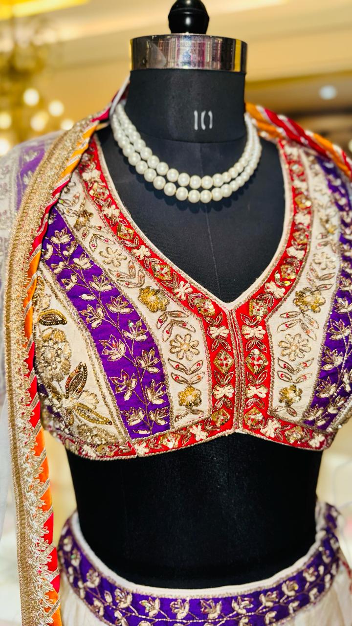Premium Off-White Georgette Lehenga with Violet & Red Zari Border and Attached Cape Dupatta