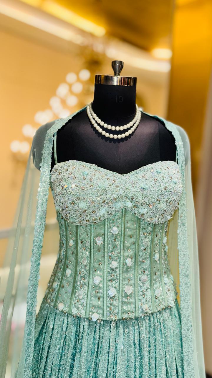 Seafoam Green Corset Lehenga with Heavy Vertical Sequin Paneling and Sheer Cape Dupatta