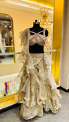 Designer Champagne Gold Ruffled Lehenga with Criss-Cross Strappy Bustier and Attached Organza Trailing Drape